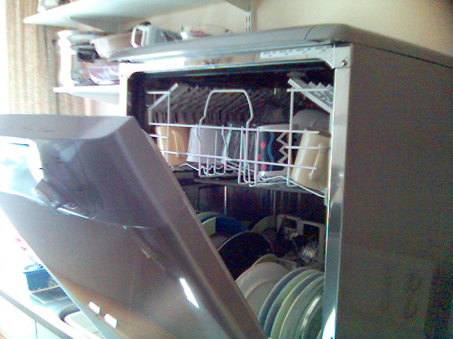 whirlpool dishwasher making clicking noise