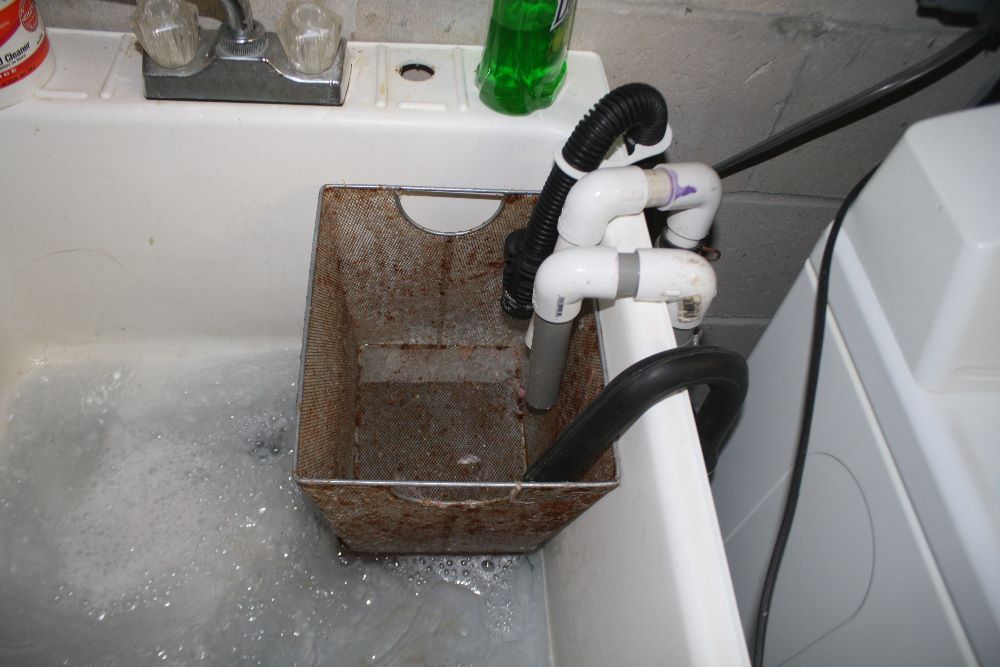 Washing Machine Drain Hose Lint Trap Filter, reusable, laundry standpipe -  Drain-Net