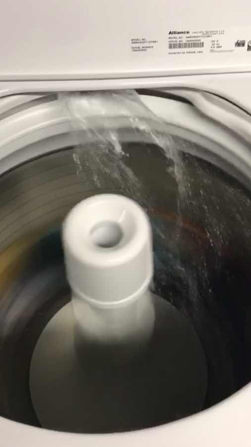 speed queen washer leaking from underneath