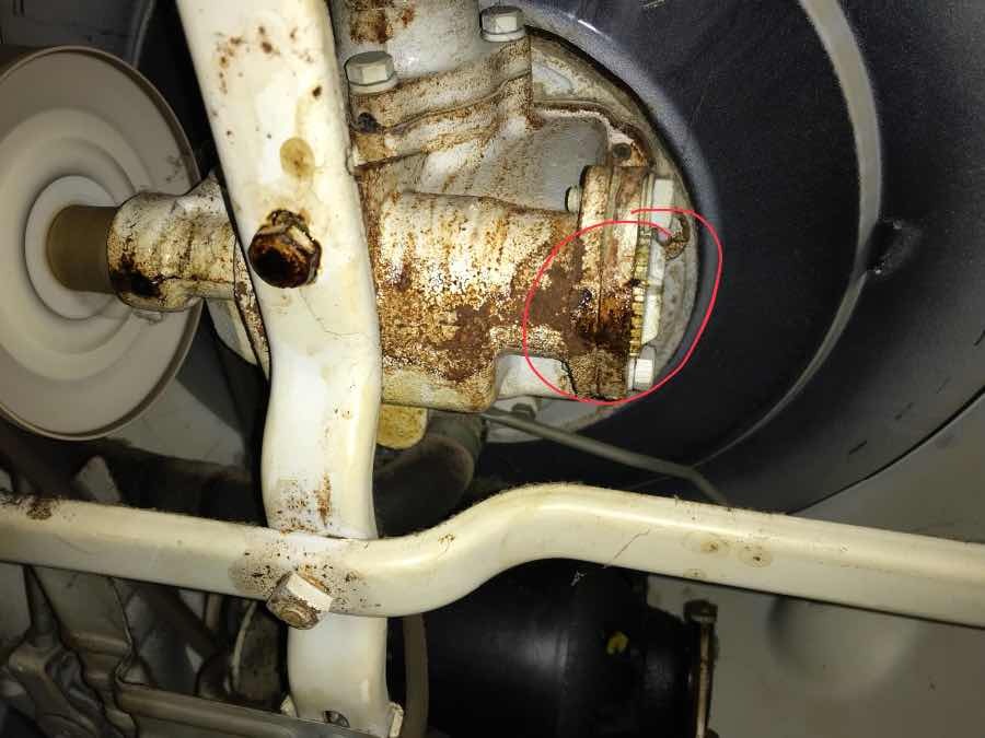 washing machine leaking oil from bottom